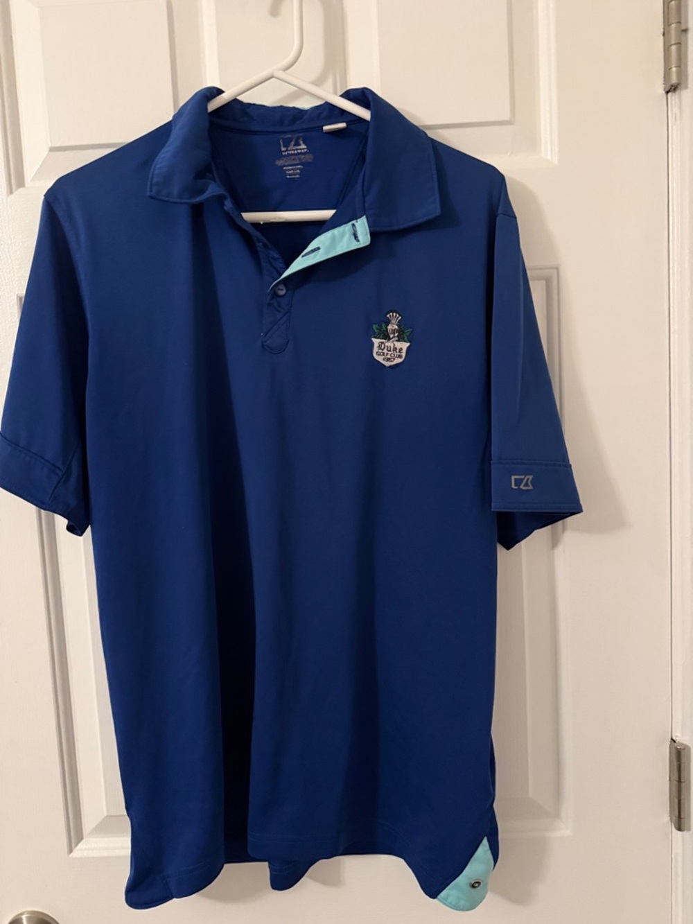 Men's Royal Blue Performance Polo. Washington Duke Inn & Golf Club